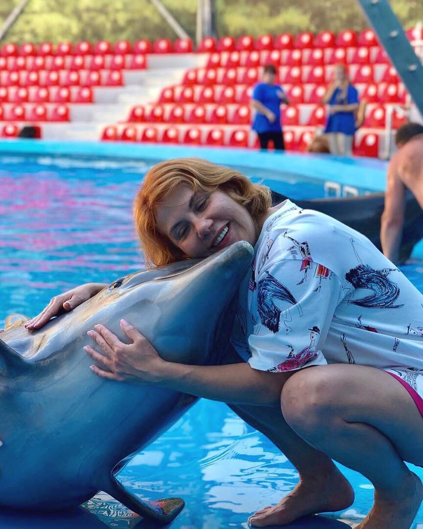 Марина Федункив с дельфином