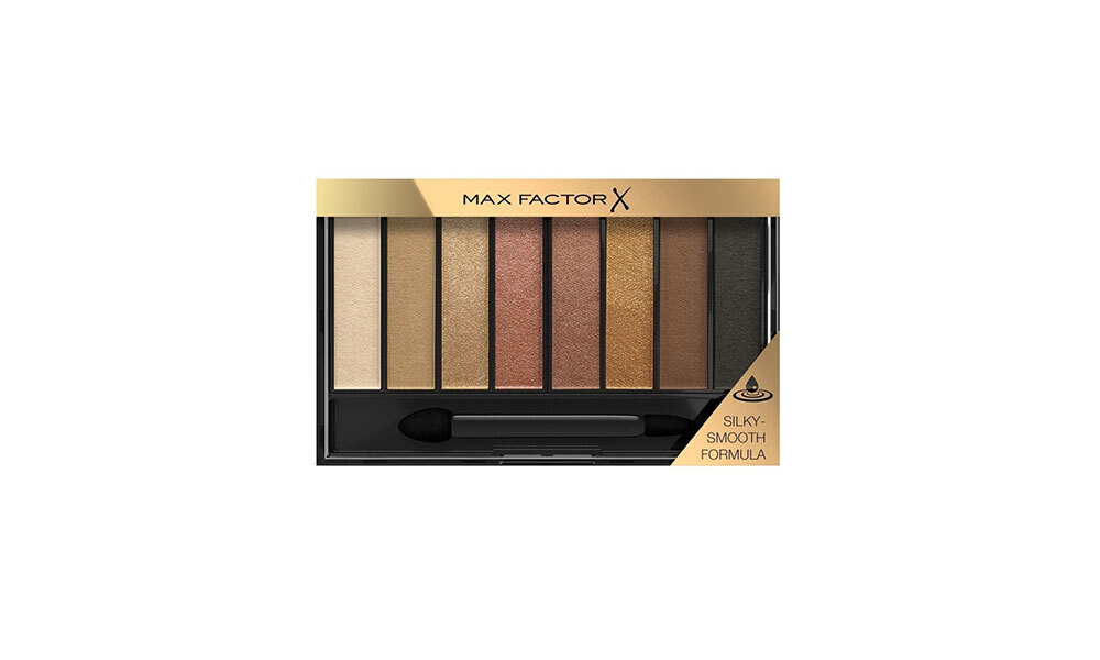 Палетка теней для век Masterpiece Nude Palette, тон 02 Golden Nudes, Max Factor, универсальная палитра теней для придания выразительности глазам. Благодаря восьми идеально подобранным оттенкам вы можете создать гламурный макияж глаз в стиле «нюд». Формула: запеченные тени с насыщенным пигментом для более яркого цвета. Палитра включает тени трех разных текстур — матовые, атласные и блестящие. Цена 623 рубля.