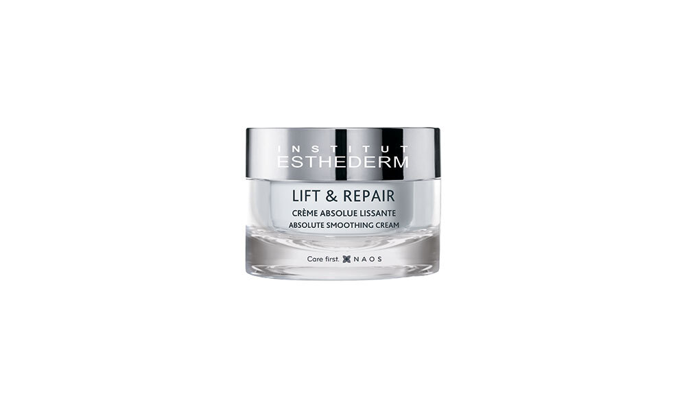 Разглаживающий крем Lift & Repair Absolute Smoothing Cream, Institut Esthederm, крем для контура глаз делает кожу упругой, подтянутой и сияющей. Средство имеет текстуру лифтингового крема, мгновенно разглаживает и стирает морщины, «гусиные лапки» и следы усталости. Взгляд становится свежим и отдохнувшим. Подходит для всех типов кожи, особенно для уставшей и/или зрелой кожи с потерей упругости и тонуса, а также при наличии возрастных изменений. Цена 9099 рублей.