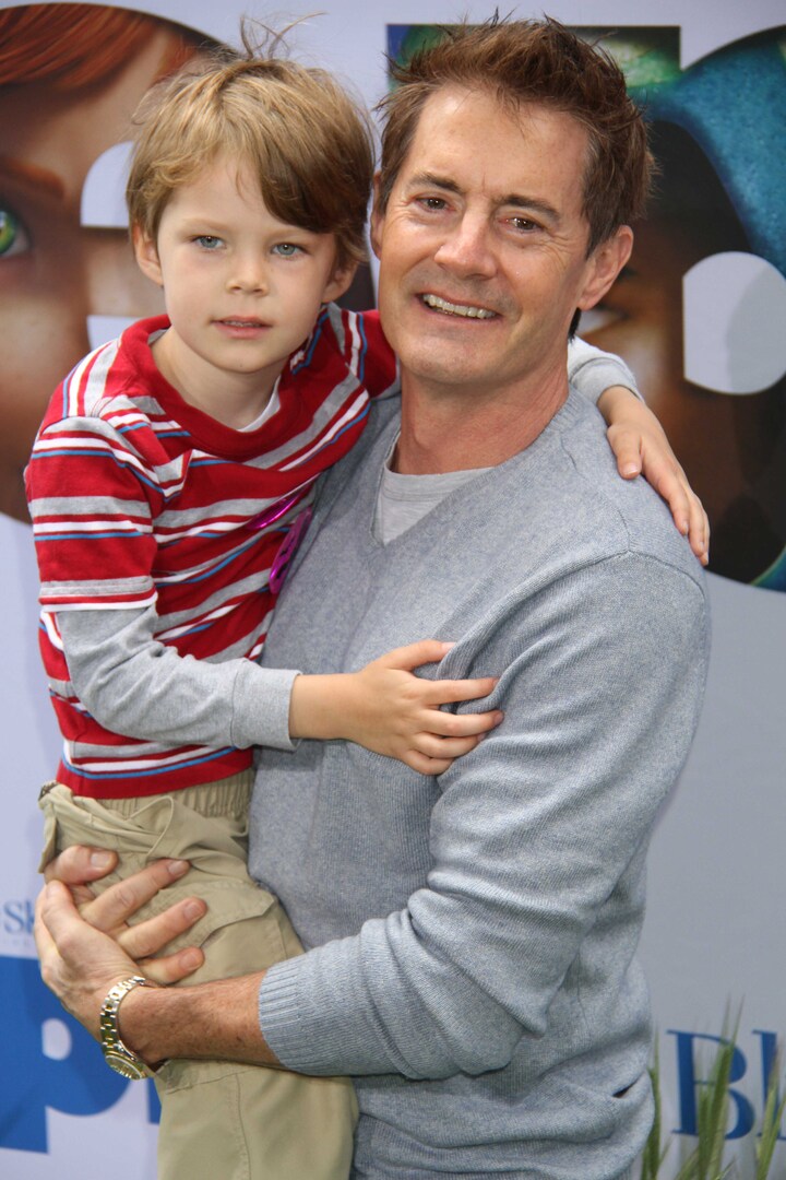 Кайл с сыном в 2013 году