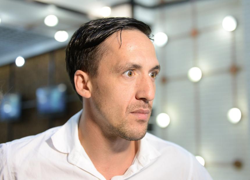 Смольянинов* выступил в США со значком террористической организации на футболке